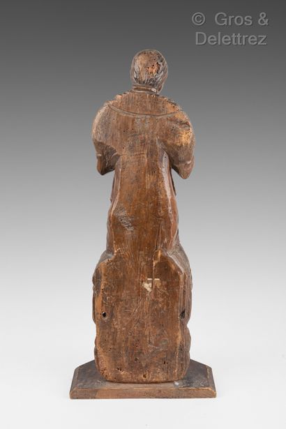 null Wooden sculpture of a Virgin with three angels at her feet.

18th century

Height...