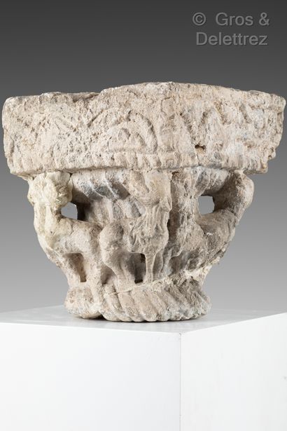 null Limestone capital carved on all sides with birds and heads.

Partly from the...