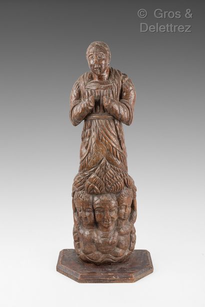 null Wooden sculpture of a Virgin with three angels at her feet.

18th century

Height...