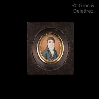 null Oval miniature depicting a young man with a frock coat on an orange background....