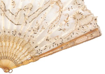  Fleurs d'or, Europe, circa 1900-1920 Folded fan, the leaf in tulle and needle lace...