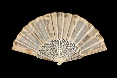 null Conter fleurette, Europe, circa 1880
Folded fan, the tulle and silk leaf embroidered...