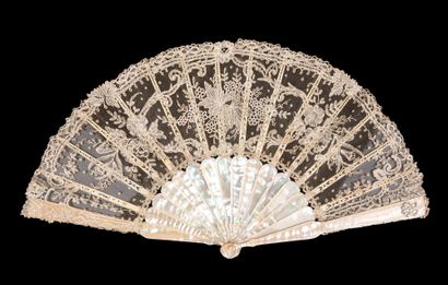 null Flowers and foliage, Europe, circa 1880
Folded fan, the tulle leaf decorated...