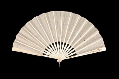  Empire spirit, Europe, circa 1900-1910 Folded fan, the leaf embroidered with scrolls,...
