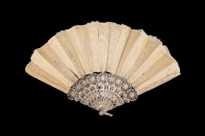 null Silver filigree, Europe, circa 1880
Folded fan, the leaf in bobbin lace with...