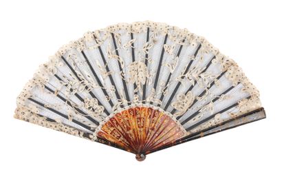  Flowers, Europe, circa 1900 Folded fan, the black tulle leaf decorated with contrasting...