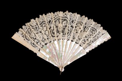  Two fans, late 19th century *One, the leaf in bobbin lace with flowers. The central...