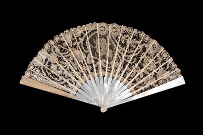  Two fans, late 19th century *One, the leaf in bobbin lace with flowers. The central...