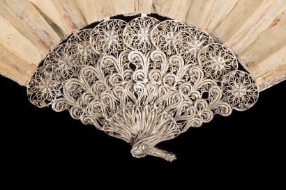  Silver filigree, Europe, circa 1880 Folded fan, the leaf in bobbin lace with flower...