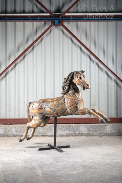 null Carousel horse in molded and carved wood, formerly painted.

Around 1900

Length...