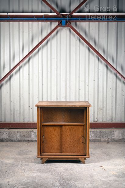 null Veneered bar cabinet with two sliding doors and a mobile storage space. circa...