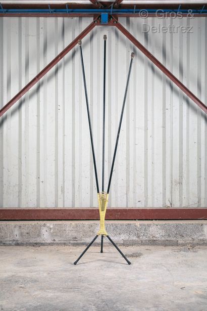 null Floor lamp in black lacquered metal with three arms of light joined by links....