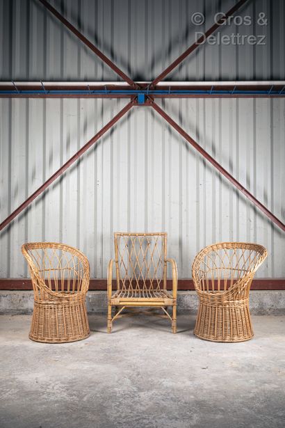 null Pair of rattan armchairs with circular seat.

A rectangular armchair is attached.

Height:...