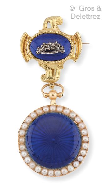 null Blue enamelled yellow gold watch brooch underlined by a silver flower bouquet...