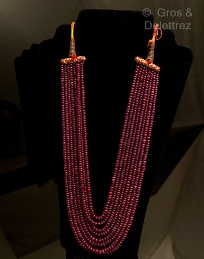 null Necklace "Drapery" composed of eight rows of ruby root held by sliding passementerie...