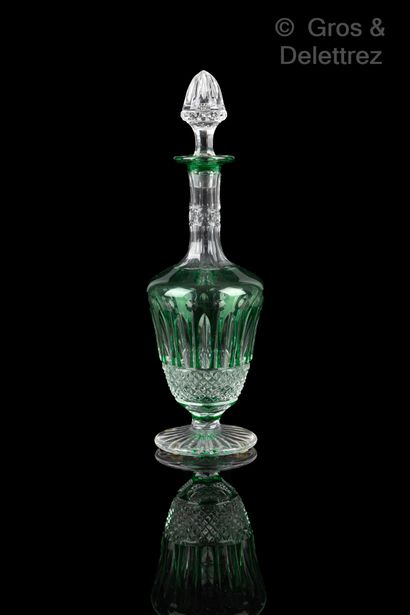 null Saint Louis. Bottle in cut crystal lined green model Tommy. Height : 26 cm