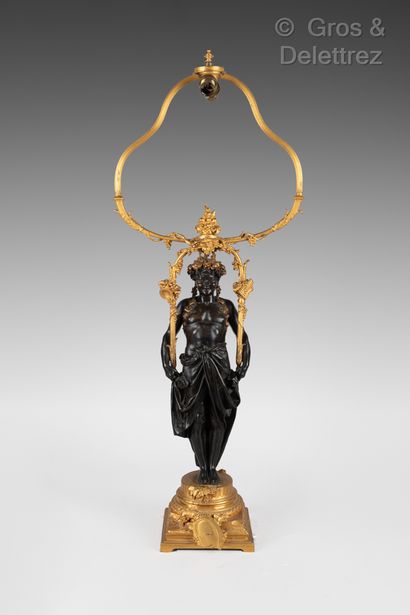 null Lamp in patinated and gilded bronze representing a young Bacchus. Louis XVI...