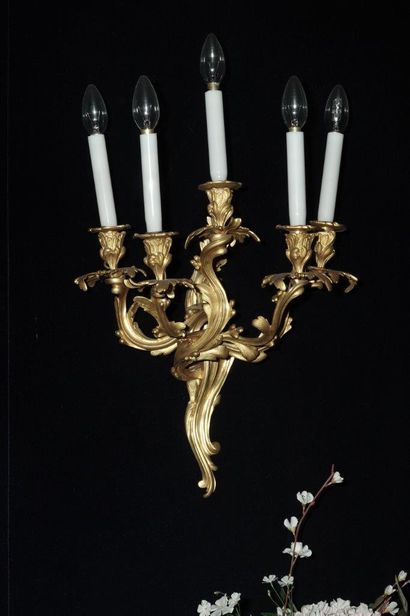 Pair of ormolu sconces in rocaille style...