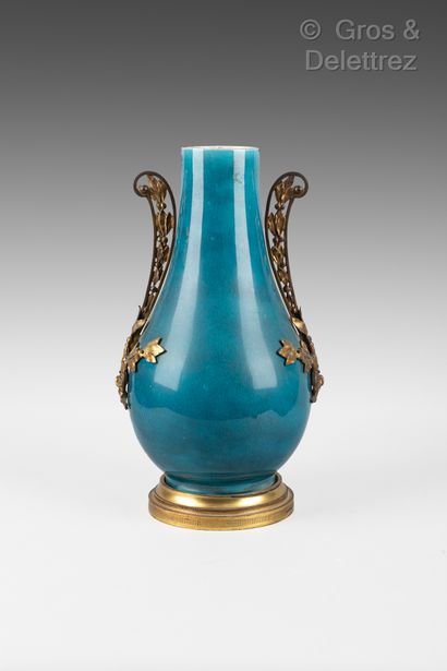 Vase of baluster form out of blue porcelain...