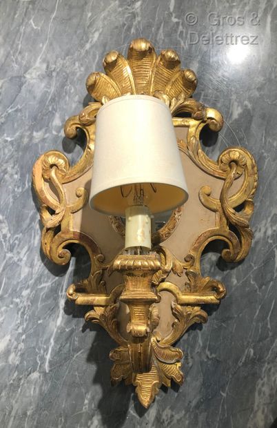Suite of four Regency style carved and gilded...