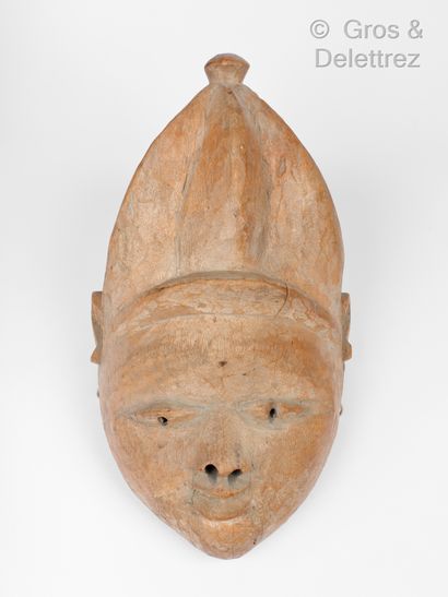 null Côte d’Ivoire Masque féminin Gouro, en bois sculpté, patiné Haut : 35 cm