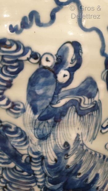 null 
China Porcelain baluster vase decorated in blue with dogs on a celadon background...