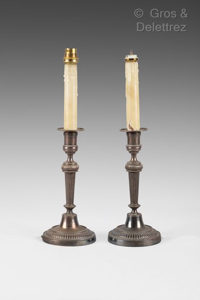 null Pair of silver-plated metal lamps in the Louis XVI style. Height : 23 cm