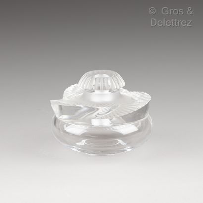 null Lalique France. Small bottle out of pressed moulded glass partially satiny with...