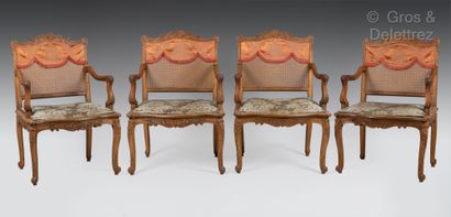  Suite of four armchairs in natural wood...