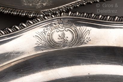 null Pair of silver dishes of violonnée form, the edge underlined of godrons. Engraved...