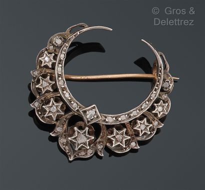 null Gold and silver "Crescent" brooch, decorated with stars set with rose-cut diamonds....