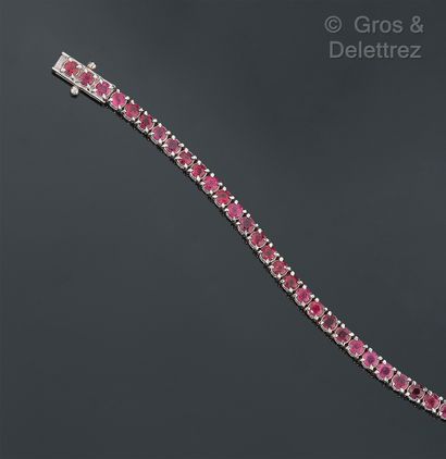 null Bracelet "Ligne" in white gold, entirely set with round faceted rubies. Length...