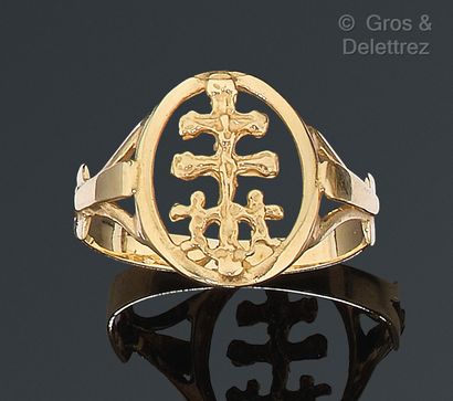 Yellow gold ring representing two angels...