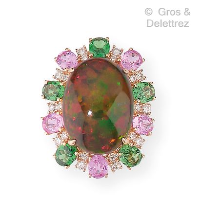 null Pink gold ring, set with a Gilson opal in a setting of pink sapphires, tsavorite...
