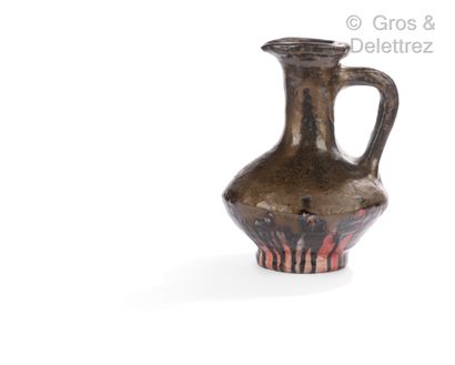 ALICE COLONIEU (1924-2010) Glazed ceramic pitcher with golden and red shades Signed...