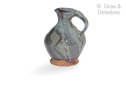 Anne KJAERSGAARD (1933-1990) Enamelled stoneware pitcher with blue shades Monogrammed...
