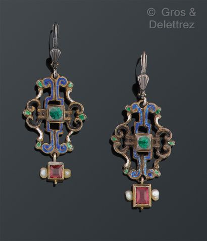 null 
Openwork silver set, enhanced with polychrome enamel and decorated with stones,...