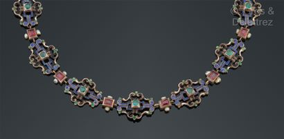 null 
Parure en argent ajouré, rehaussée d’émail polychrome et ornée de pierres,...