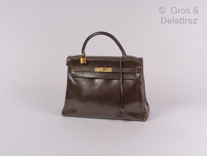 HERMES Paris Bag " Kelly Retourné " 32 cm in box coffee, gold plated fasteners and...