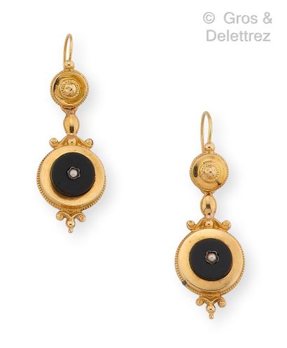 null 
Pair of yellow gold earrings, each composed of a sleeper (18K) holding a circular...