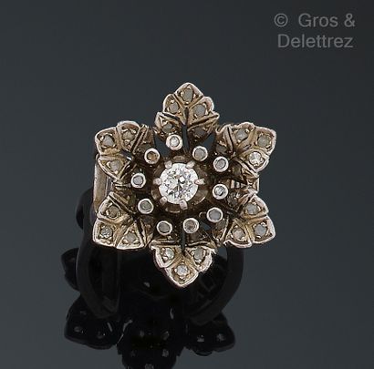null White gold "Flower" ring, set with an old-cut diamond in a circle of rose-cut...