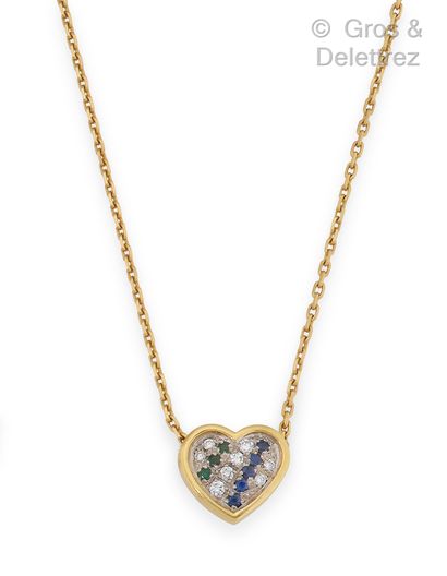 null Yellow gold "Heart" pendant, decorated with faceted sapphires and emeralds on...