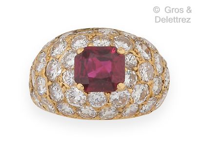 null Yellow gold "Jonc" ring, set with a cushion-shaped ruby on a pavé of brilliant-cut...