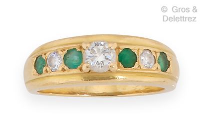 null Yellow gold "Jonc" ring, set with a brilliant-cut diamond, the ring set with...