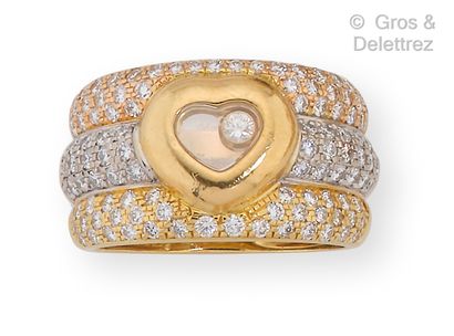 CHOPARD "Happy Diamonds" - Ring composed of three gold bands of three colors highlighted...