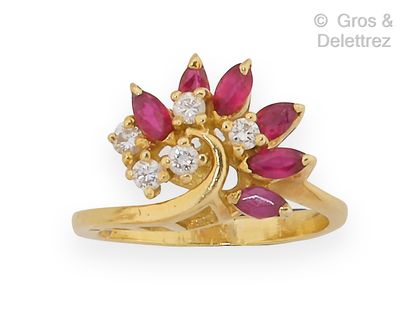 null Yellow gold "Flower" ring set with navette-shaped rubies and diamonds. Finger...