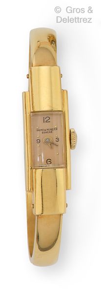 BAUME ET MERCIER Yellow gold lady's watch bracelet, rectangular case (23 x 10 mm)...