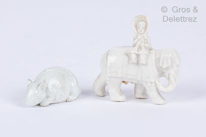 null Lot composé d'une souris et d'une fillette sur un éléphant en porcelaine blanche.

Long...