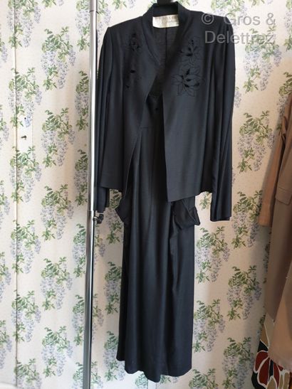 null Nina Ricci Boutique Set composed of a black linen dress, openwork neckline and...