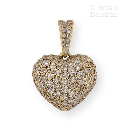 null Yellow gold "Heart" pendant, set with a pavement of brilliant-cut diamonds....